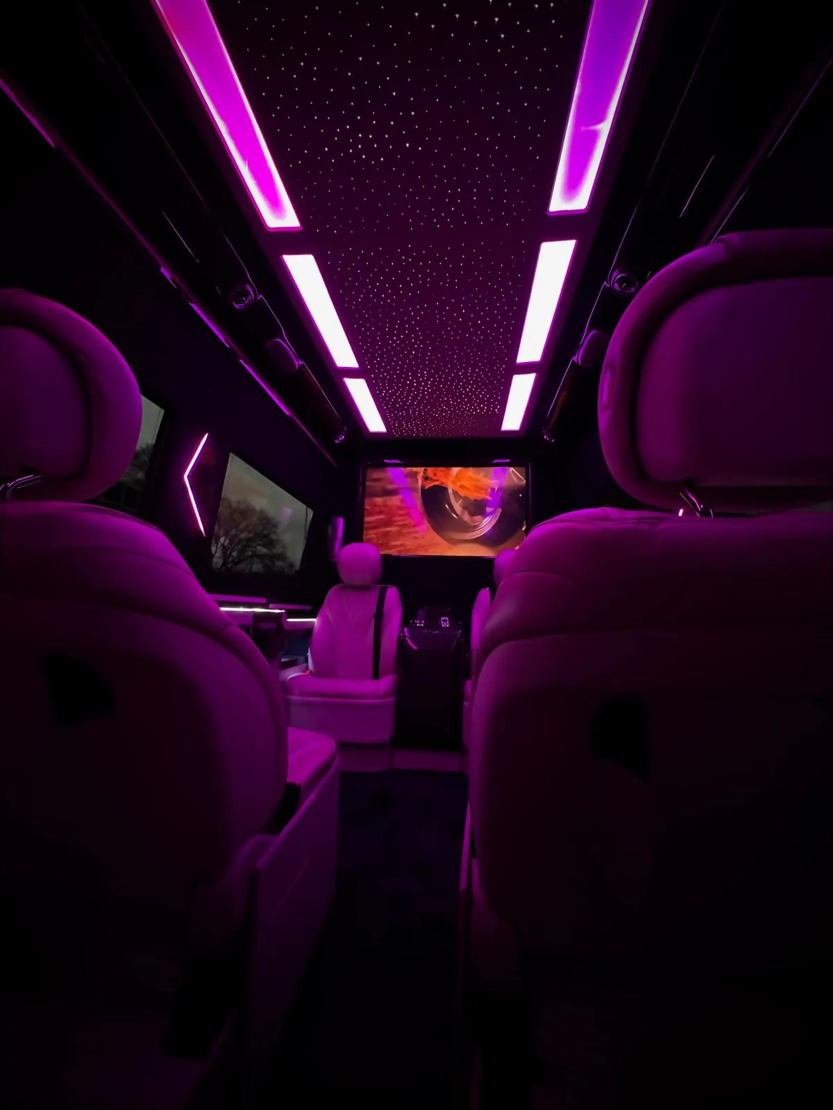 Starlight ceiling and purple ambient lighting inside a V-Protect interior